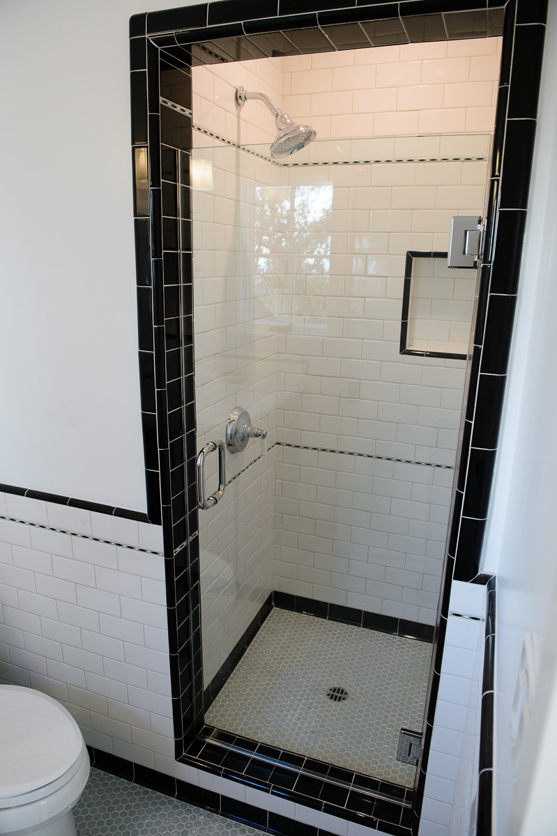  Master Bed • Beautiful tiled walk in shower with frameless door 